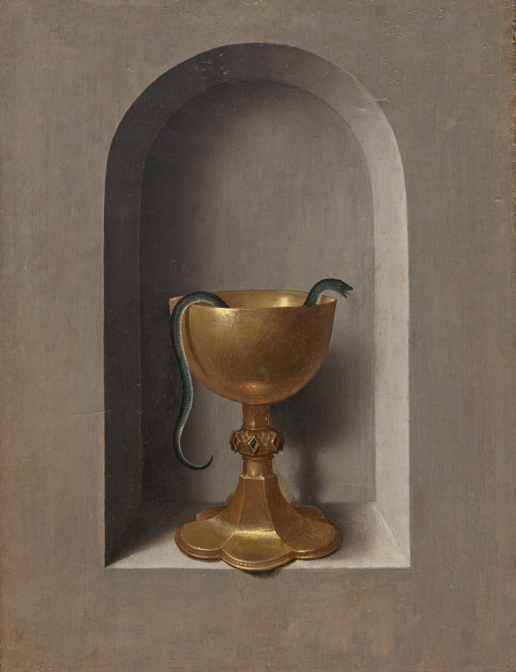 A small green snake peeks out of a golden chalice.